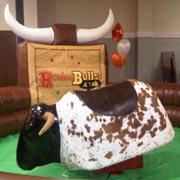 Rodeo bull with themed Wild West Inflatable